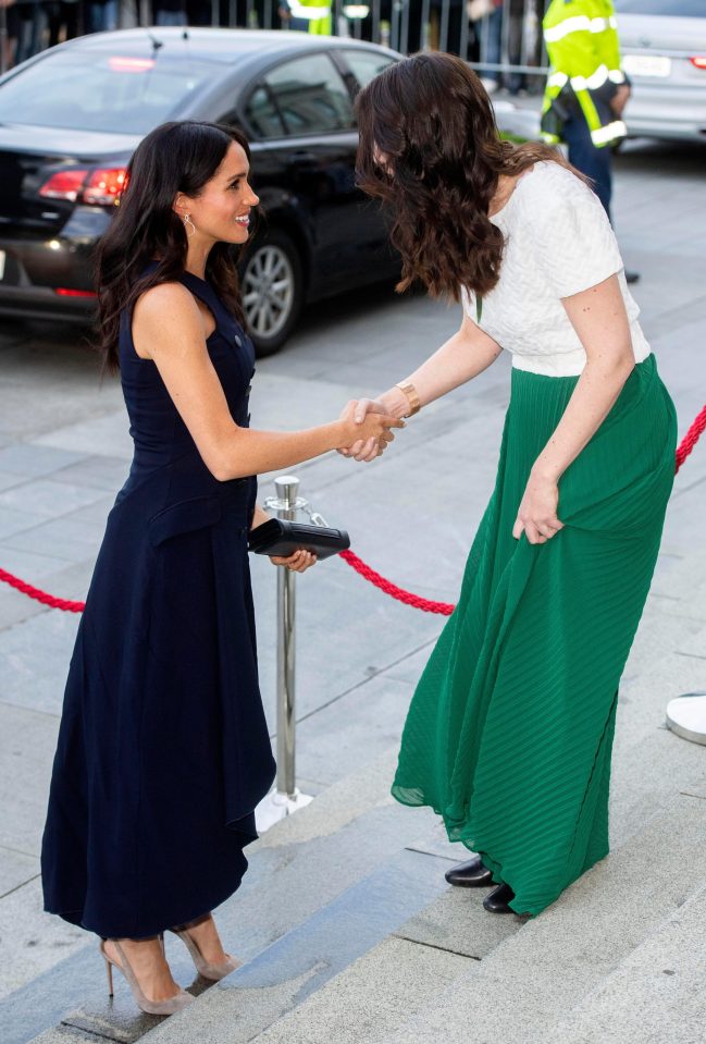  Meghan shakes hands with Jacinda Ardern, who returned to work in August six weeks after giving birth