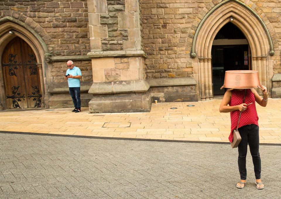  Bucket-headed Brummie outside a church in Birmingham