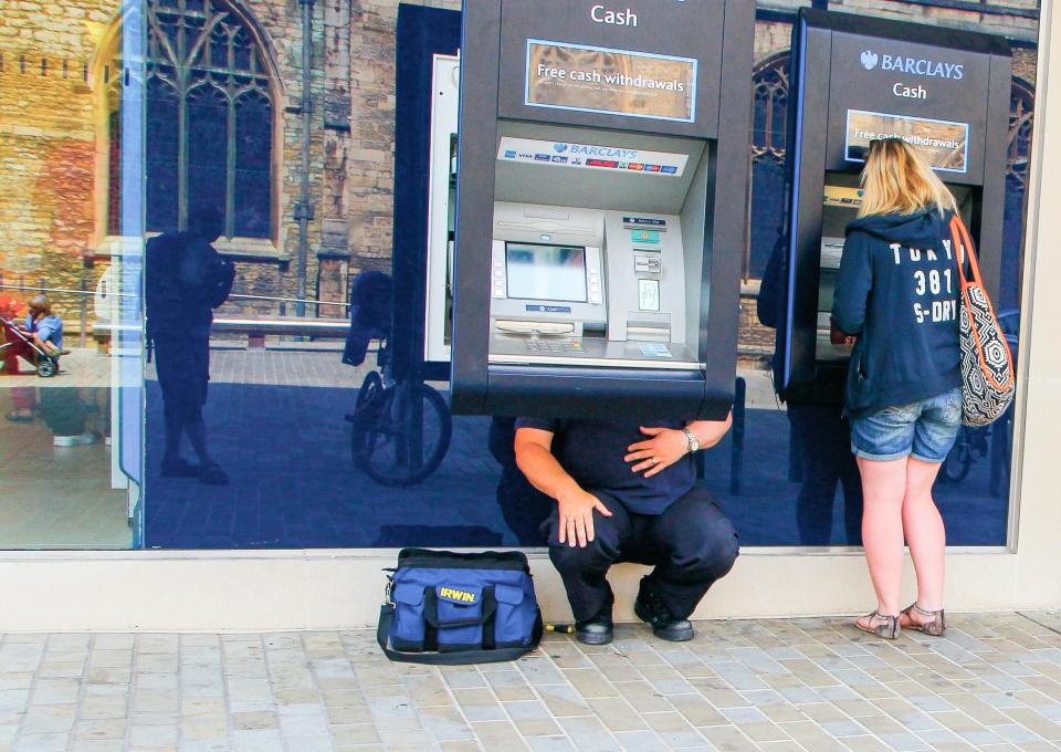  Cash machine undergoing maintenance in Peterborough