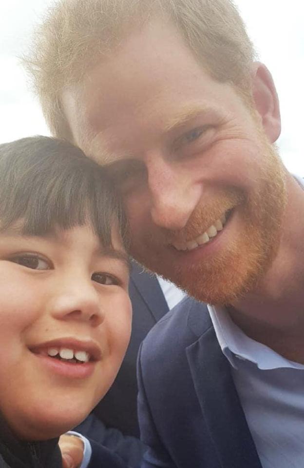  The caring prince also posed for a selfie with the youngster, who lost his mum when he was a baby