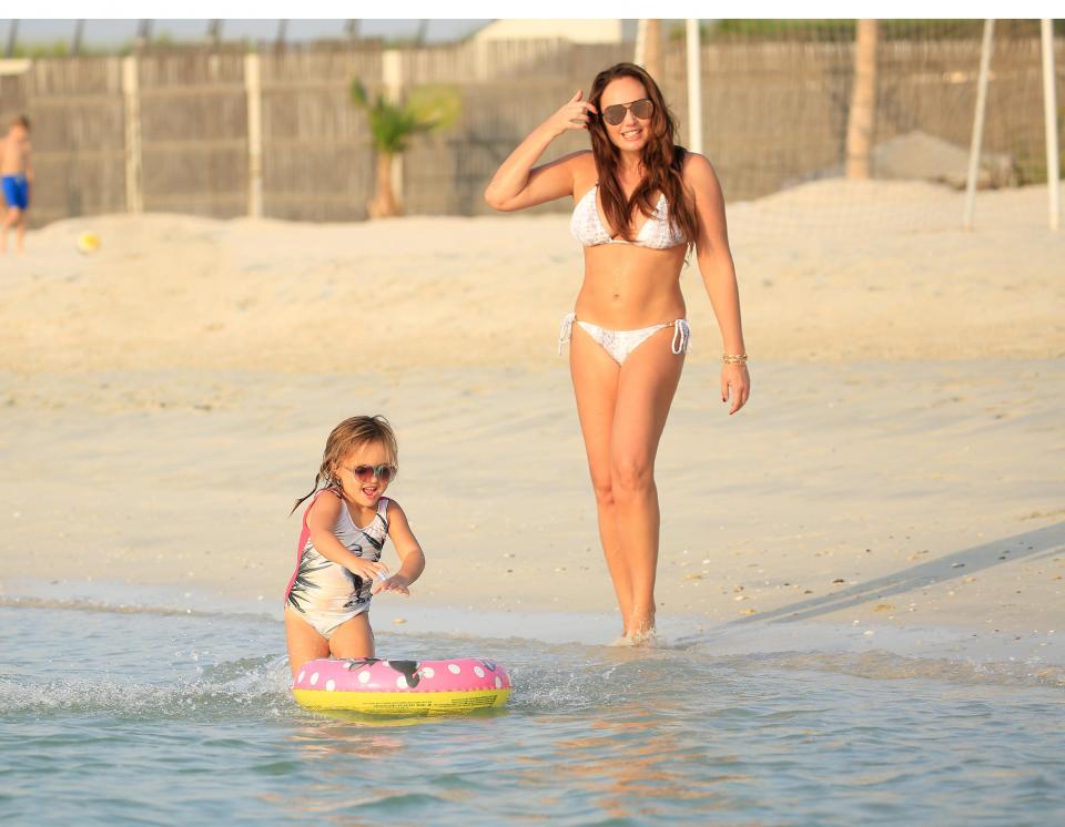  The mother and daughter looked to be having a fun day at the beach