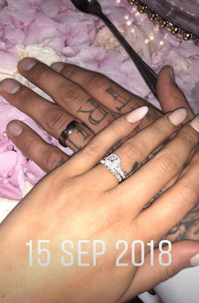  She also shared a sweet snap of the pair clasping hands to show off their wedding rings