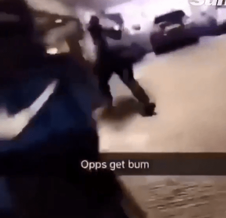 One clip shows a group of youngsters running around a car park with fireworks