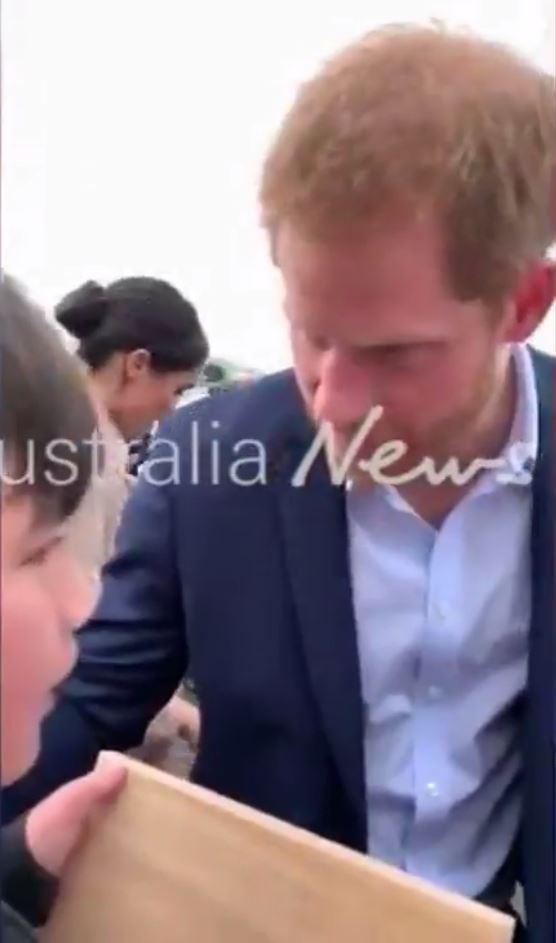  Prince Harry consoles six-year-old Otia Nante in Auckland today