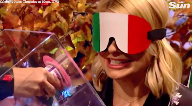  Holly squealed in terror as she was forced to lick from a mystery pot while blindfolded on tonight's Celebrity Juice