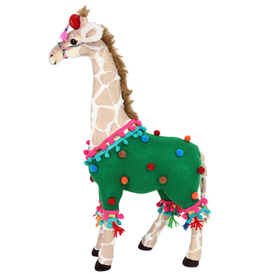  A giraffe in a knitted Christmas bauble jumper