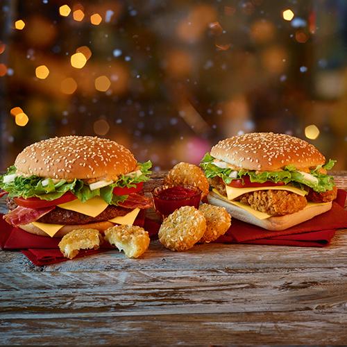  The McDonald's festive menu includes a Chicken Big Tasty (right) for the first time as well as the very popular original beef Big Tasty (left) and cheese melt dippers (centre)