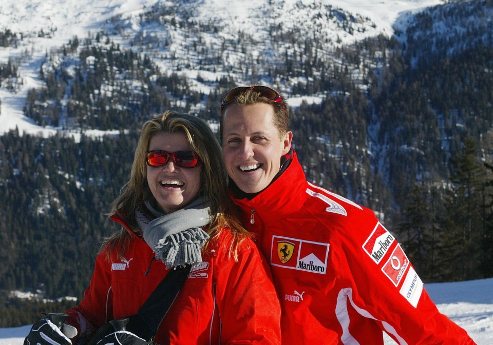 Michael Schumacher poses with his wife Corinna on the slopes in 2005