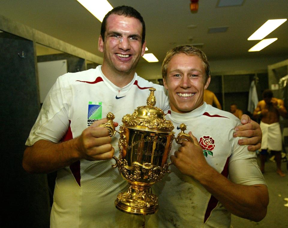  Captain Martin Johnson and match-winner Wilkinson with the Webb Ellis Cup