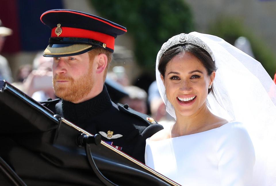  Meghan, 37, wore a diamond and platinum headpiece despite Harry telling staff before the big day: 'What Meghan wants, Meghan gets'