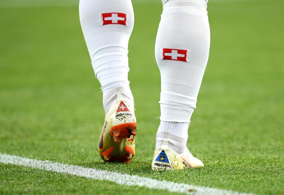  The midfielder's boots for the World Cup in Russia featured a small Kosovo flag