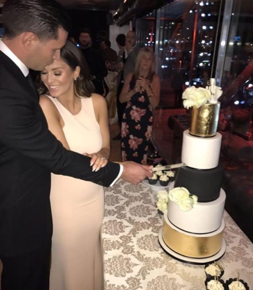  Vicky Pattison and John Noble in happier times cutting a fancy cake