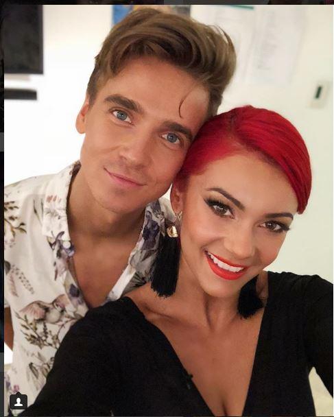 Joe insists that he isn’t dating the red-haired dancer