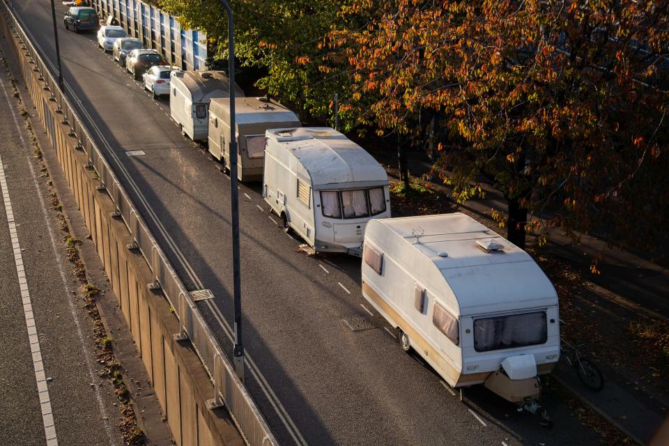  Families unable to pay their rent have been forced to live by the side of a motorway