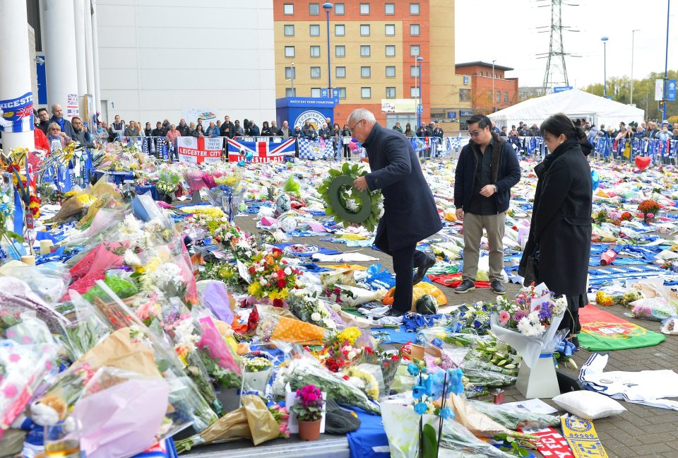  Leicester's Premier League title winning boss Claudio Ranieri lays a wreath at the stadium memorial for Vichai Srivaddhanaprabha