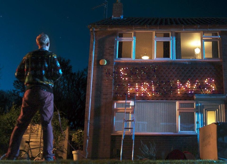  The advert starts by the cheeky fool tampering with one weary man's Christmas lights