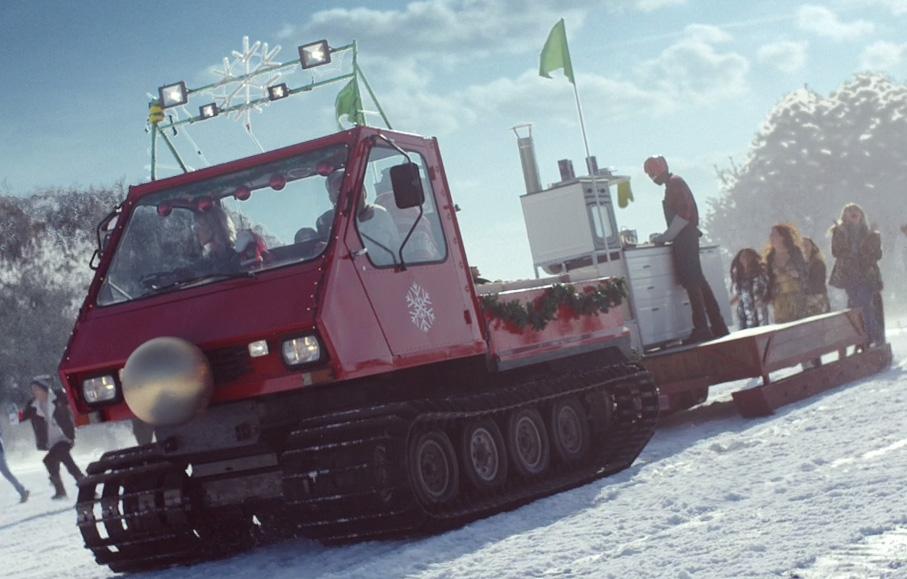  Trucks with a kitchen where a family is preparing a feast are also racing down the hill