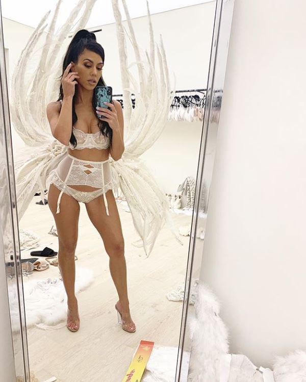  Kourtney Kardashian wowed as a Victoria's Secret Angel for Halloween but fans were distracted by her messy dressing room