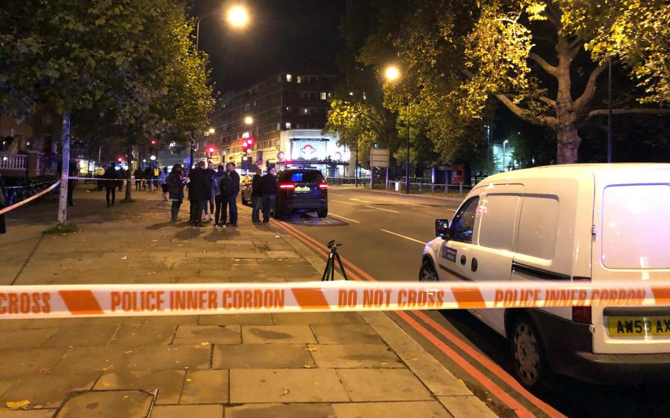  Cops rushed to the scene at Clapham South tube station on Friday