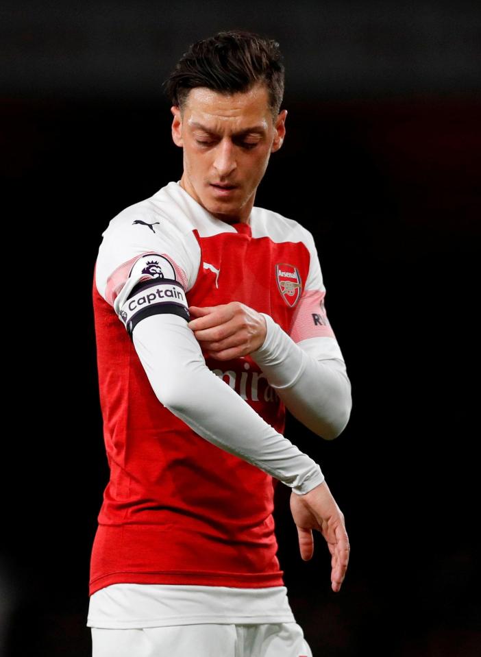  Boss Unai Emery has trusted Ozil with the captain's armband on more than one occasion this season