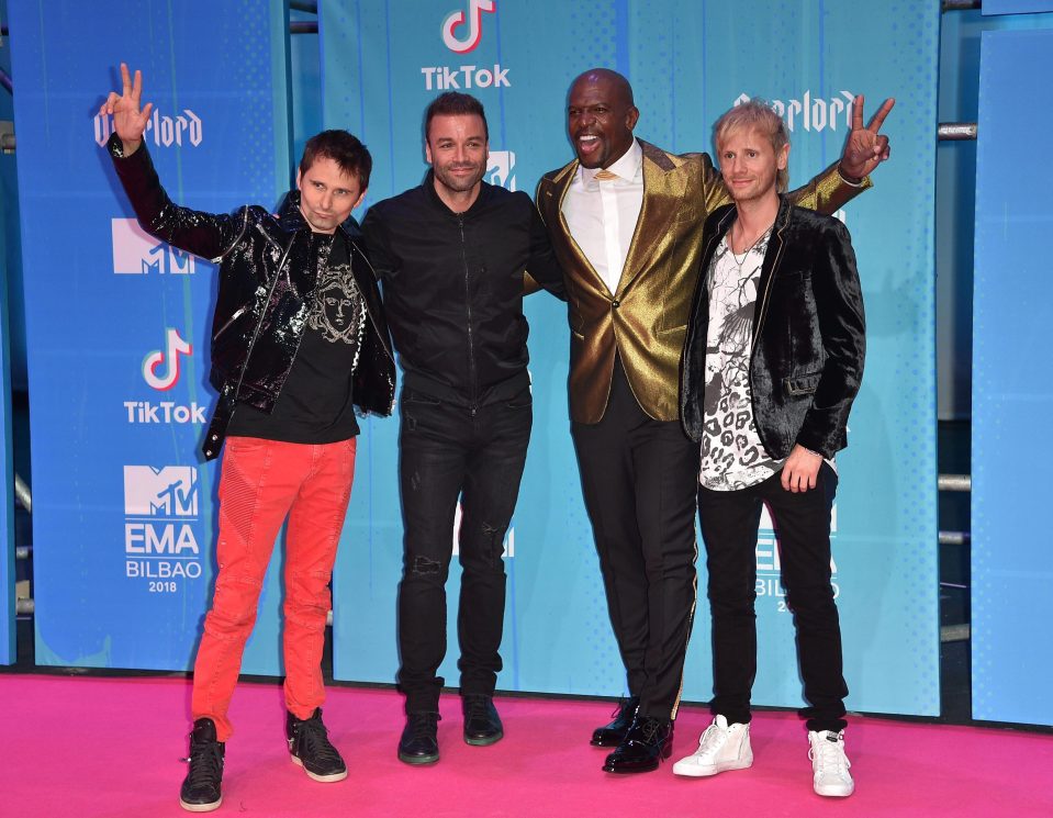  Muse pose with actor Terry Crews after performing at the MTV EMAs earlier this month