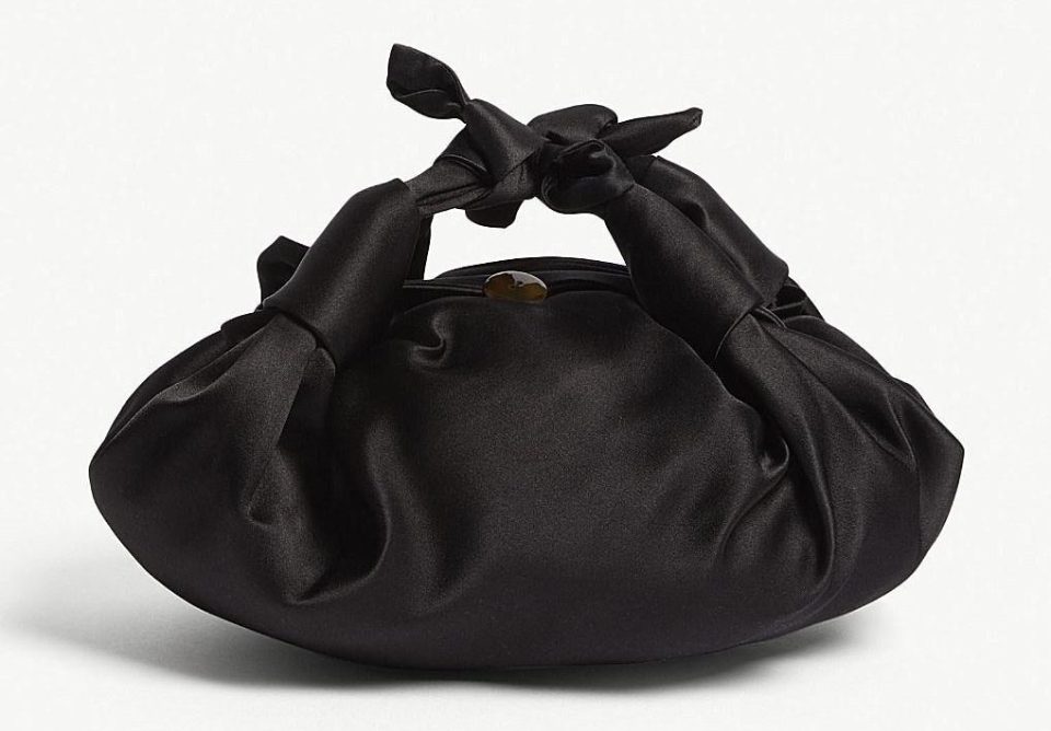  The Row's black satin bag costs £800 and is made from 100 per cent silk