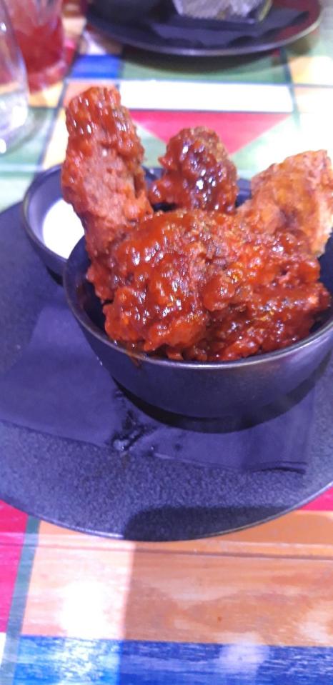  The fiery Jerk Buffalo Wings made our writer's eyes water during the starter