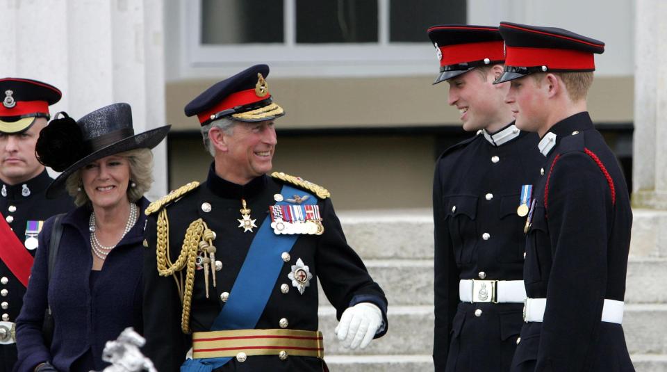  2006: Charles and Camilla chatting with Prince William and Prince Harry before leaving Sandhurst Royal Military Academy after The Sovereign's Parade that marked the completion of Harry's Officer training