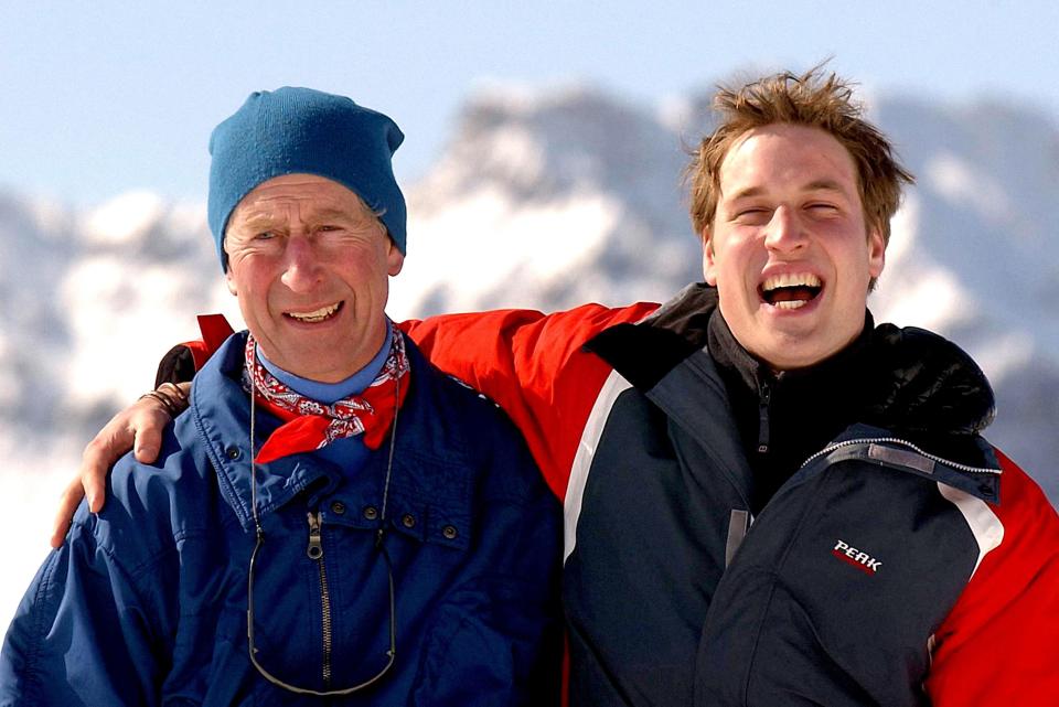  2004: Prince Charles laughing with Prince William on the Madrisa ski slopes, above the Swiss village of Klosters