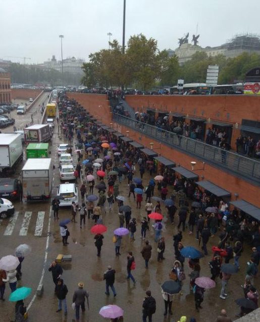  Crowds pour out into the rain swept streets of Madrid after the terminus was hit by a security scare