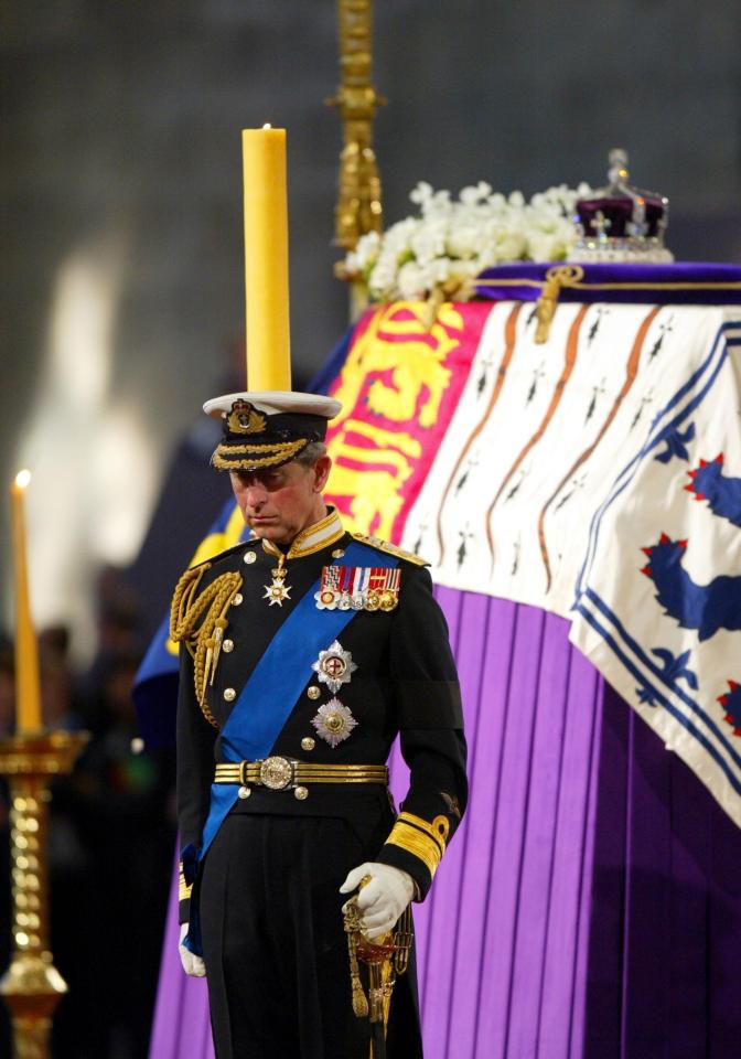  2002: The Prince of Wales standing vigil beside the Queen Mother's coffin in Westminster Hall in London on the eve of her funeral at Westminster Abbey