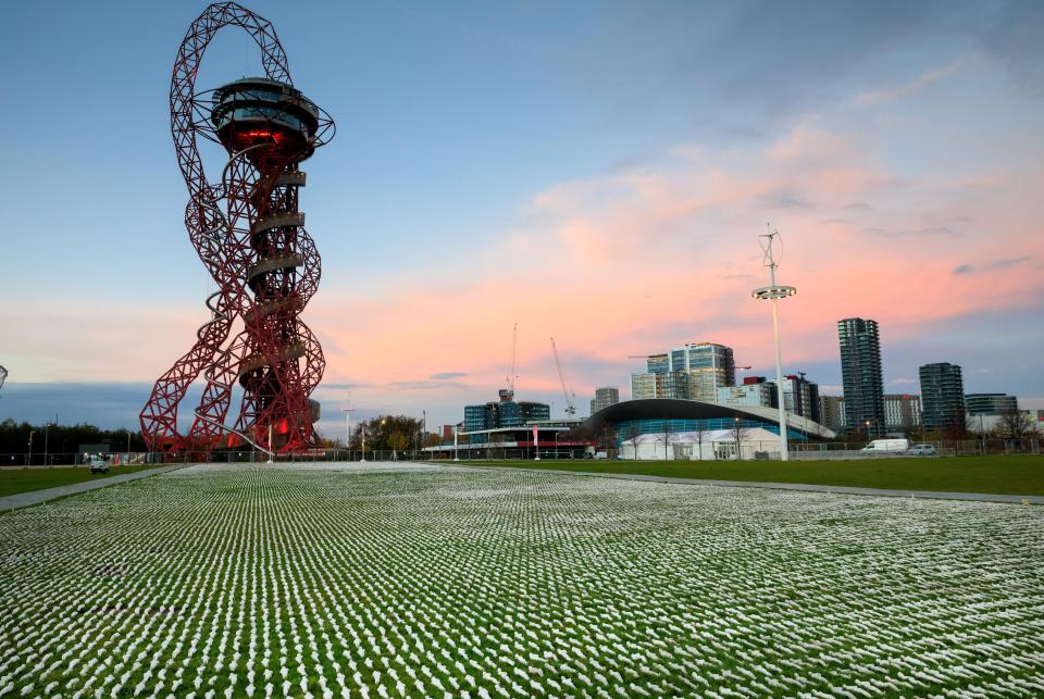  The sea of shrouds is over looked by the Olympic Park's Arcelor Mittal Orbit tower