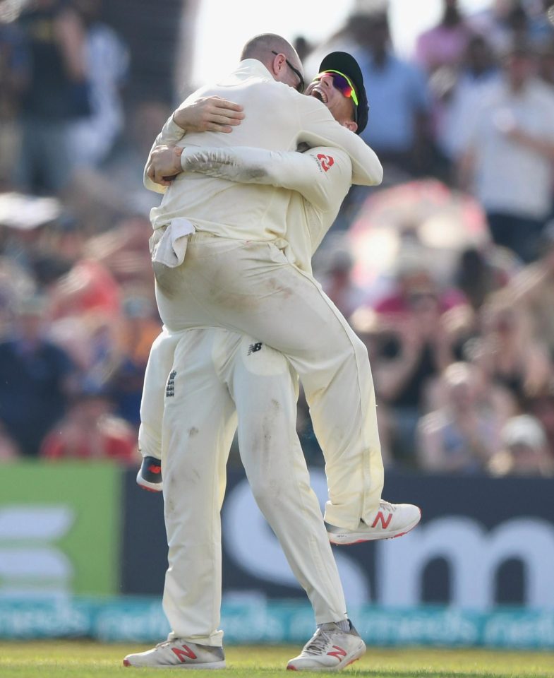  England bowler Jack Leach, left, congratulates Jos Butler after the pair combined to dismiss Sri Lanka batsman Perera