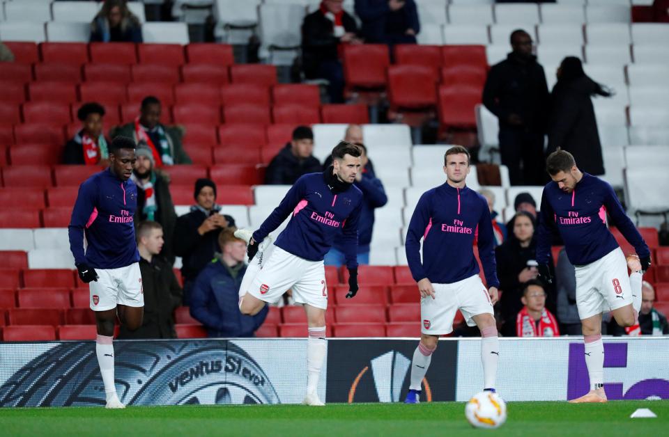  Carl Jenkinson gets into his warm-up at the Emirates ahead of their clash with Sporting Lisbon