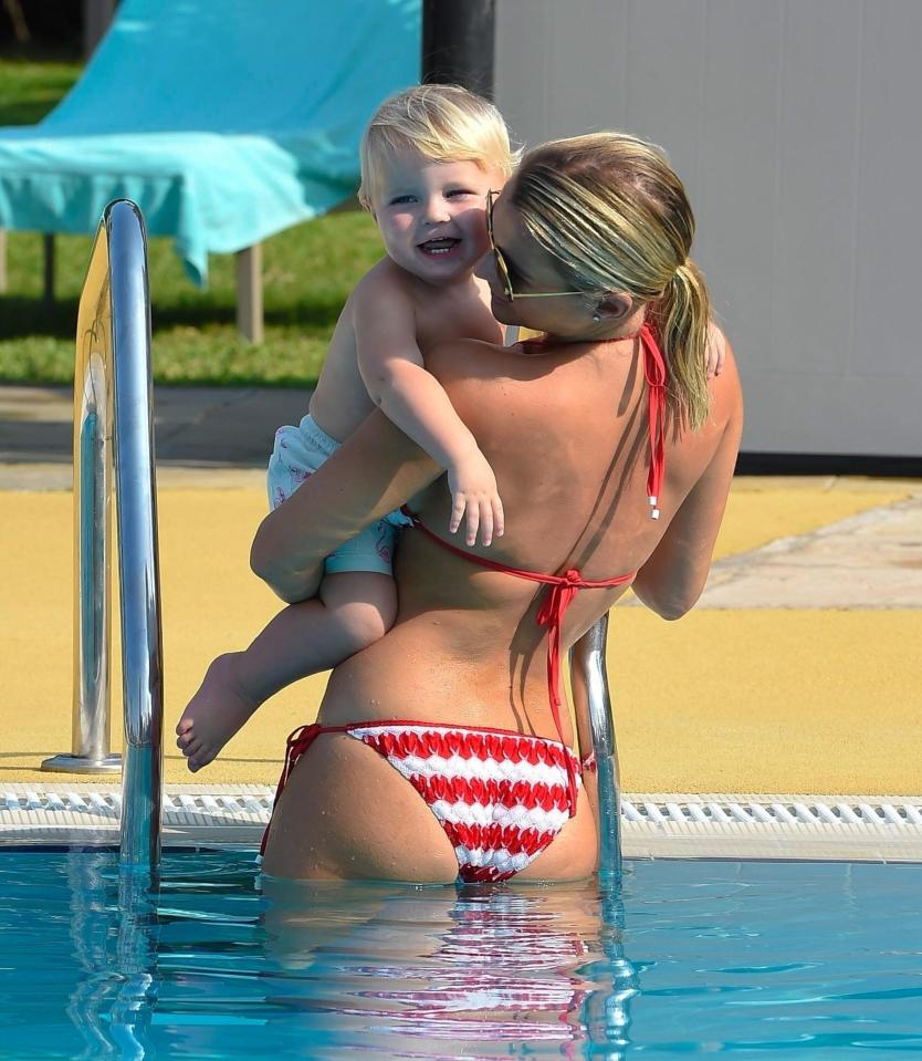  The mum-of-two looked sensational in her stripey red and white two piece