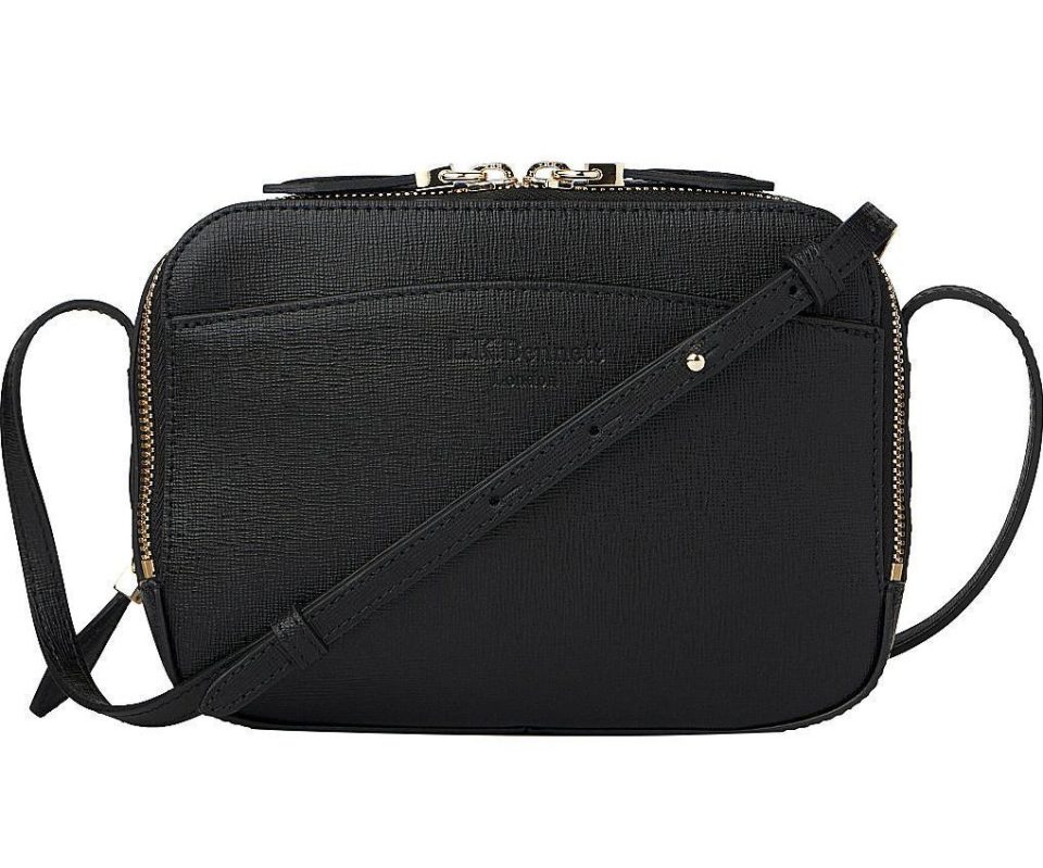  Holly's simple black handbag cost a further £155