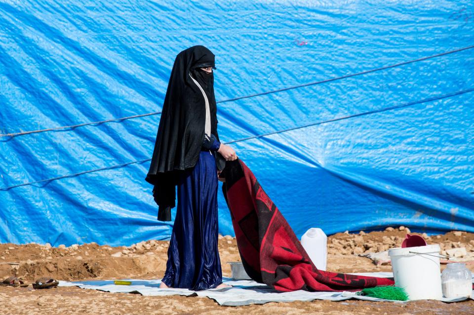  A woman does her washing at the IDP camp in Ain Issa (file photo)