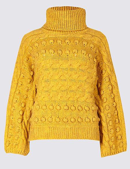  Holly's gorgeous mustard jumper is only £35 and is also available in green