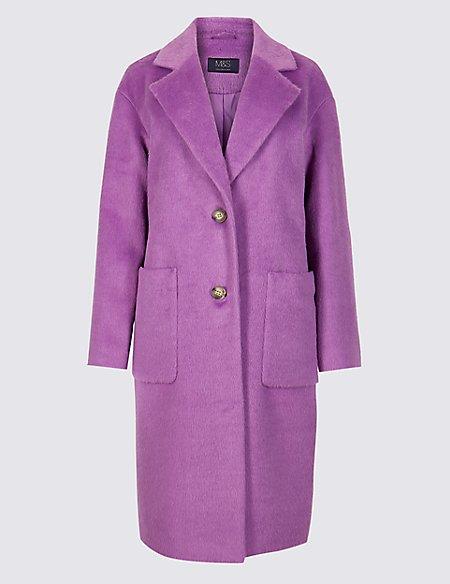  Holly's vivid purple coat has also gone on sale for £89