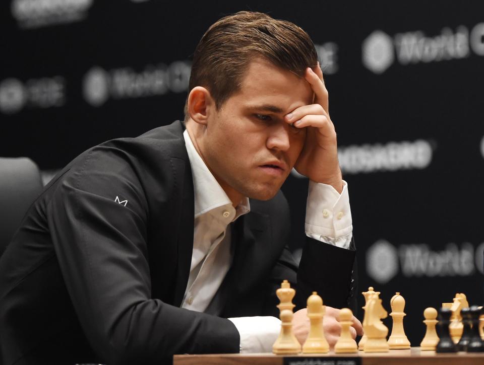  Magnus Carlsen during the Round Four game against US challenger Fabiano Caruana at the World Chess Championship 2018 in London