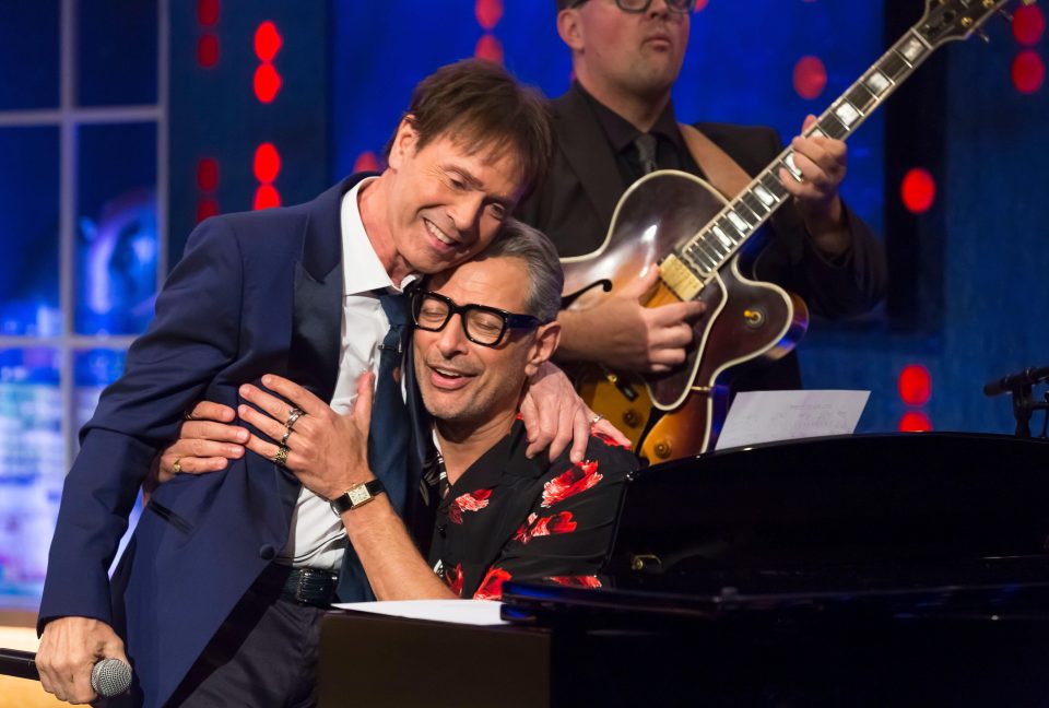  The Hollywood legend hugs Sir Cliff in another segment of The Jonathan Ross show