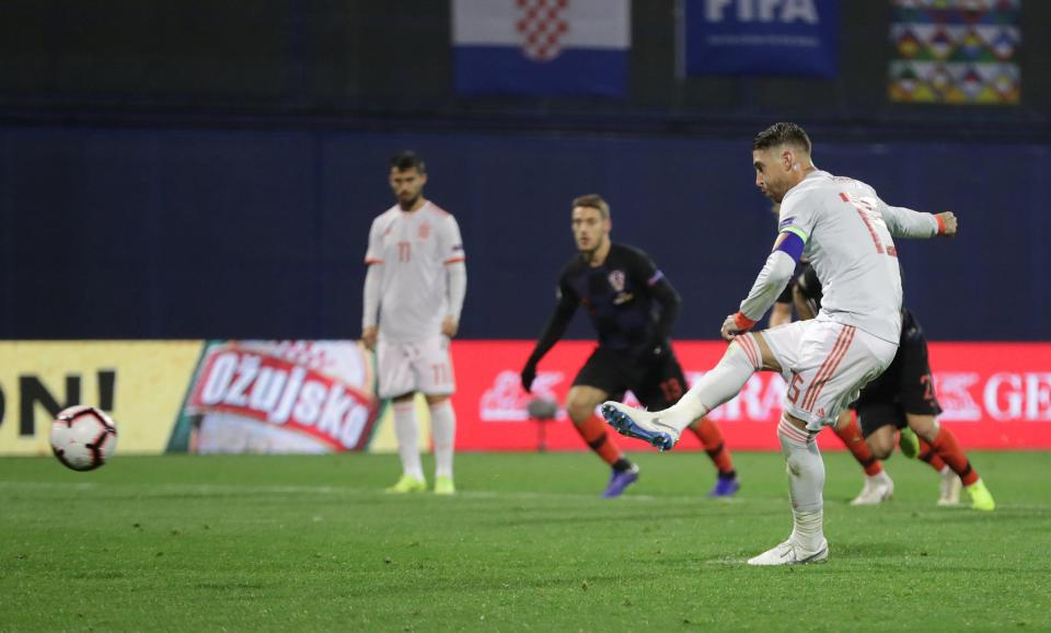  Real Madrid skipper Sergio Ramos levels it up for Spain at 2-2 with a penalty