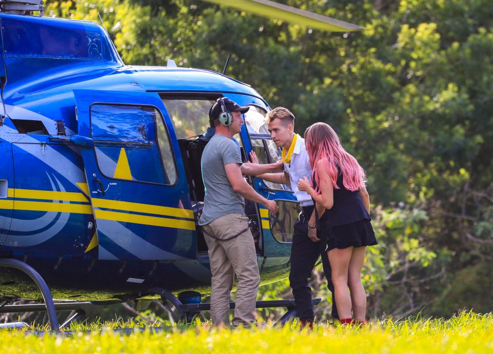  Rita could be seen sporting bright pink hair as she climbed into the helicopter with James