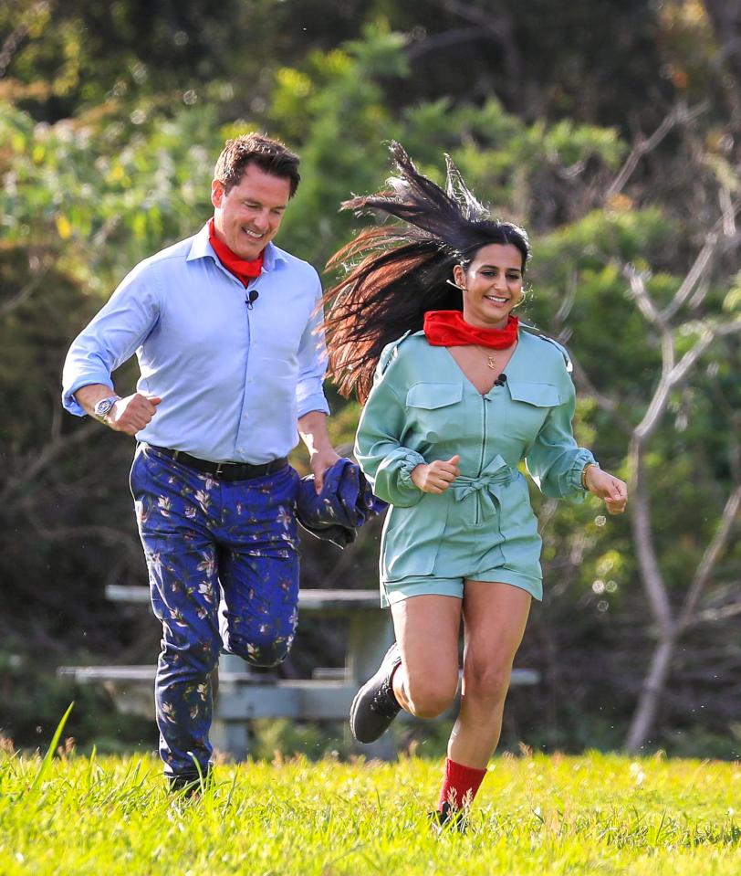  John Barrowman and Sair Khan can be seen running towards the helicopter as they prepare to fly into camp