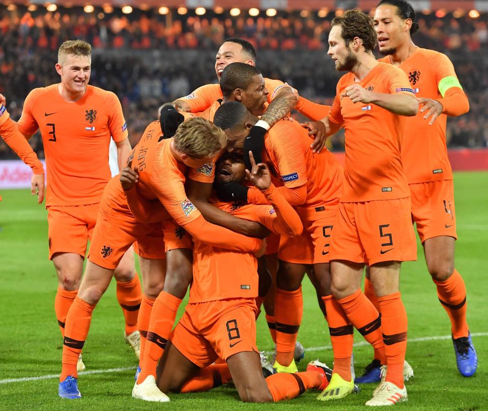  Holland players celebrate the opener against France in the Uefa Nations League clash