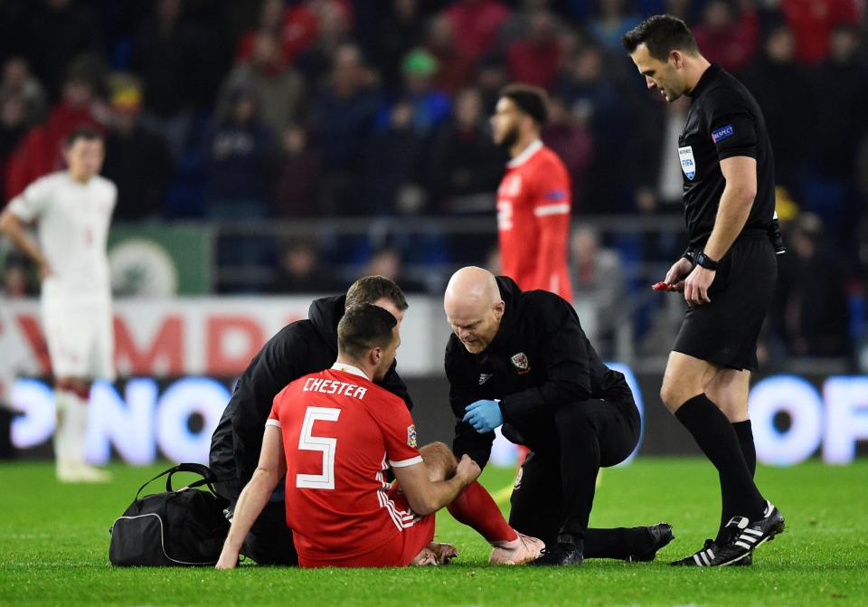  James Chaster receives medical treatment after suffering an injury shortly after the break