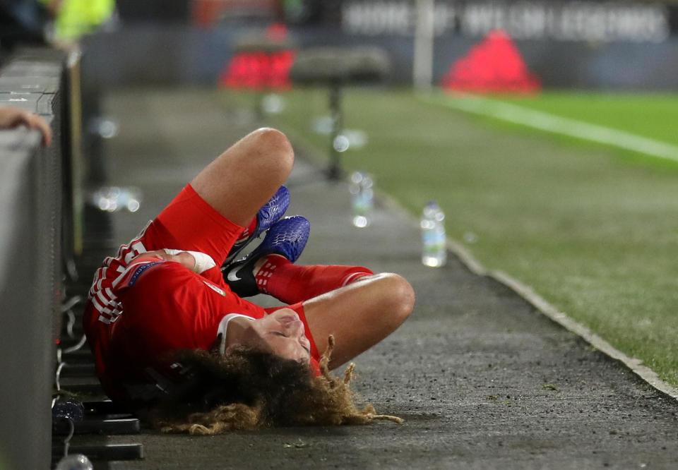  Ethan Ampadu was sent tumbling into advertising boards on the side of the pitch