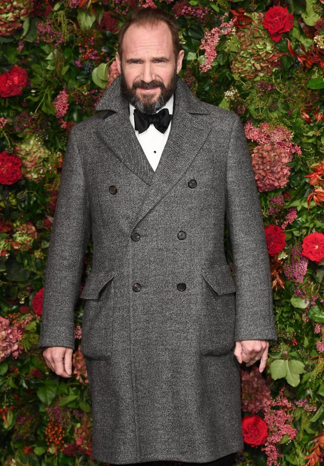  Ralph Fiennes sported a thick beard with his winter coat