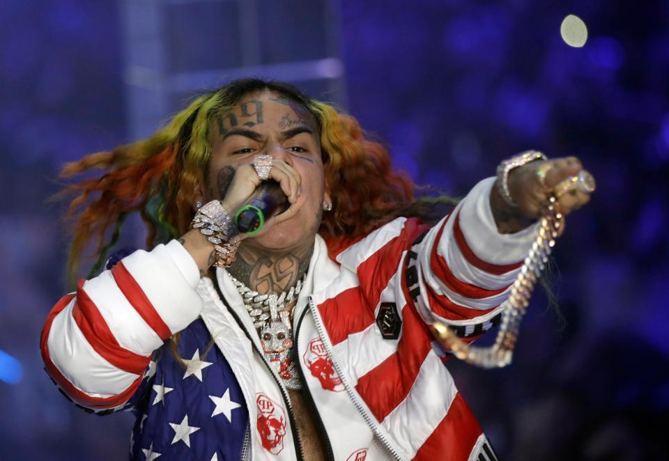  Raper Tekashi 6ix9ine is among four people arrested on racketeering and firearms charges