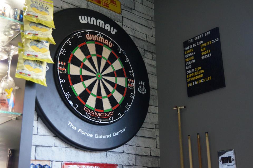  There is a dartboard as well as a pool table in the games room man cave